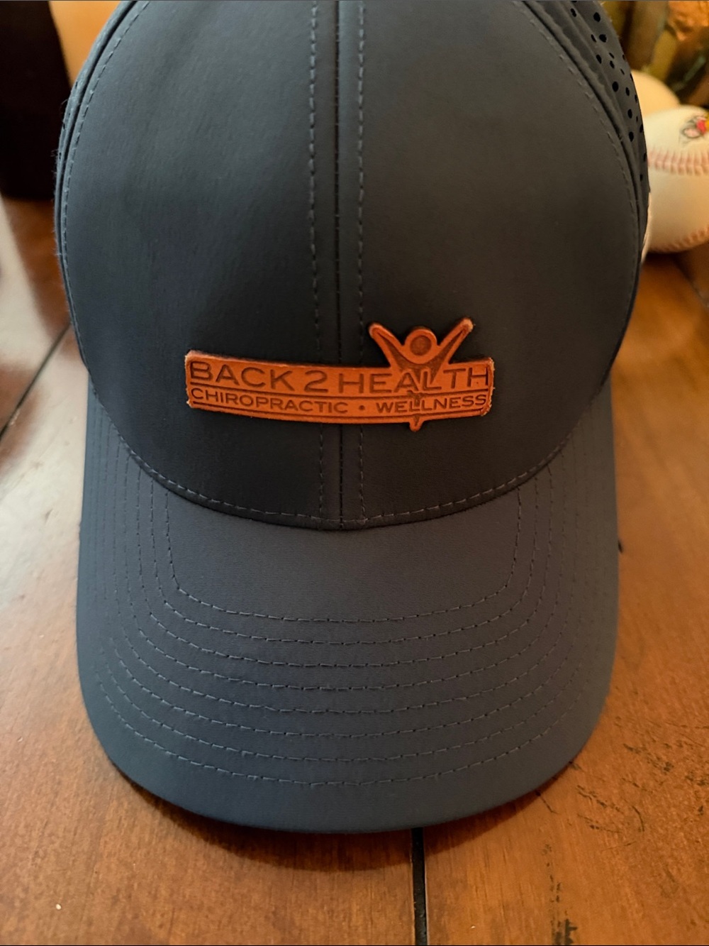 Men's Black Baseball Cap with Orange Logo